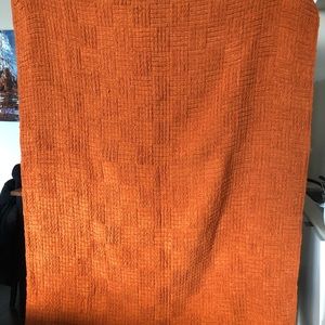 Nicole Miller Artelier Throw Blanket in burnt orange